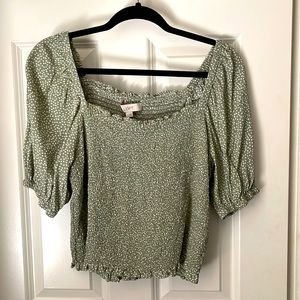 Loft Green and White small dotted smocked puff sleeve blouse.